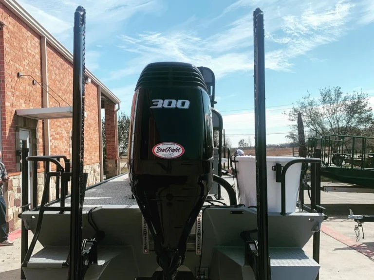 300 horsepower outboard between two shallow-water anchors
