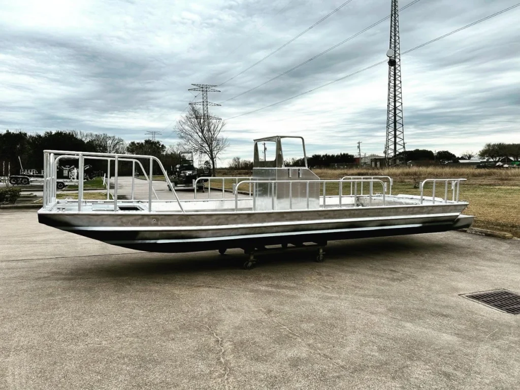 Bare aluminum Boat Right with rails, seen from the side