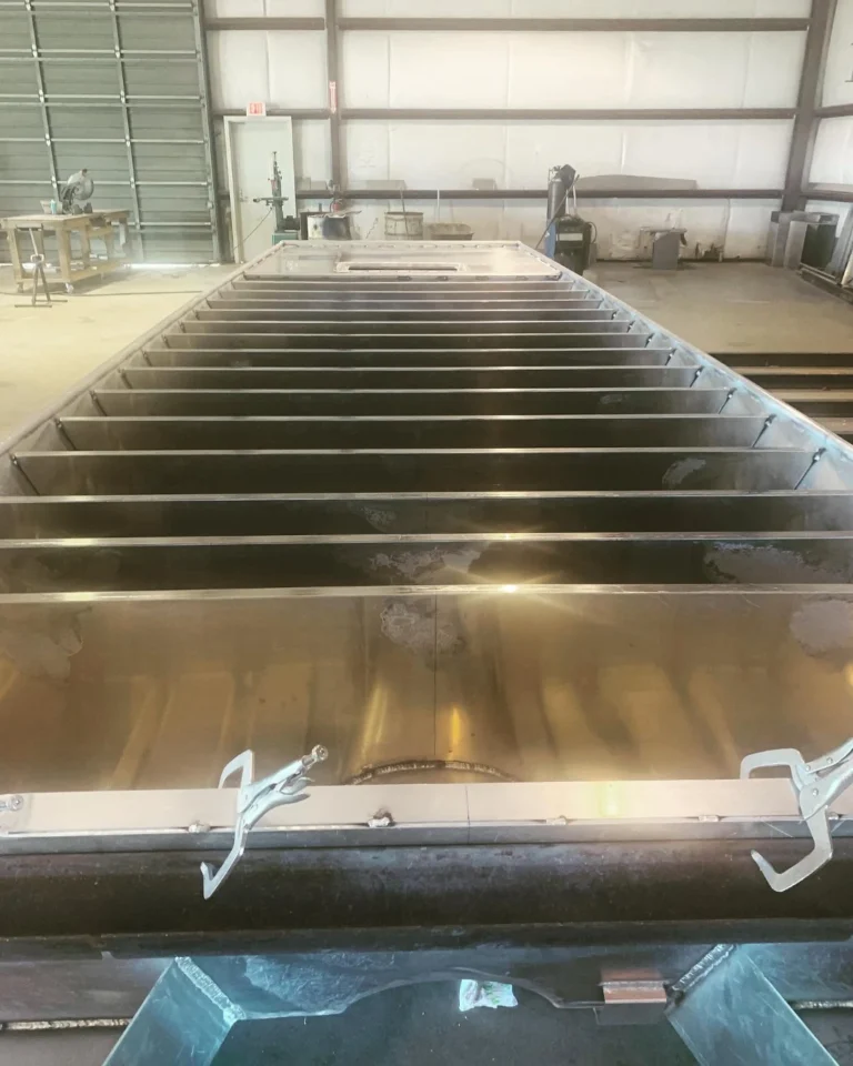Floor frames welded into a bare aluminum hull