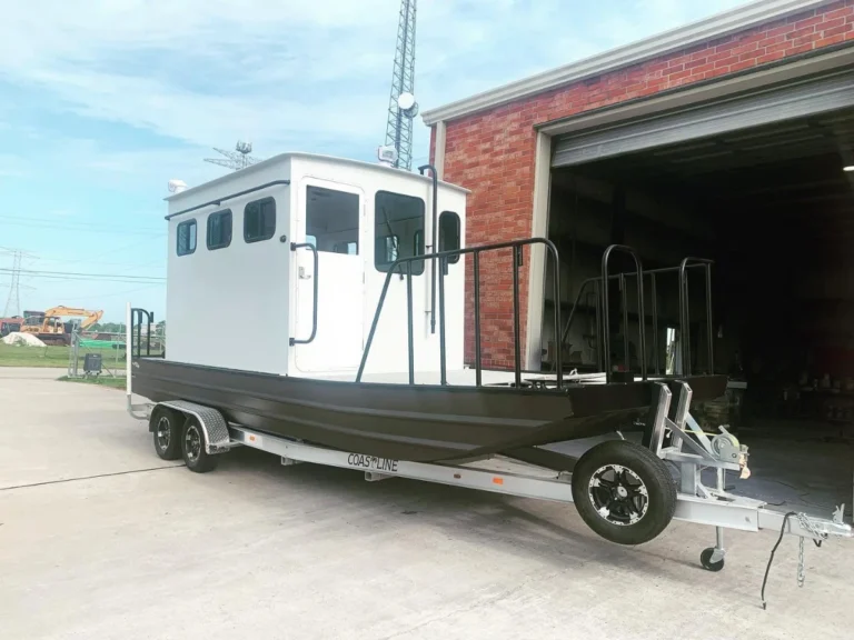 Aluminum cabin boat seen from the bow quarter