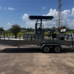 Dark Boat Right with a T-top on its trailer