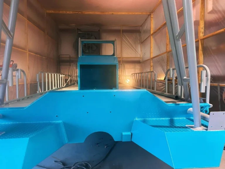 Light blue hull and console in the paint booth