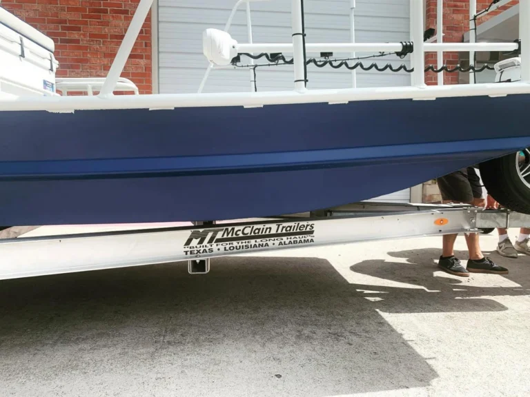 Side of a navy painted aluminum hull