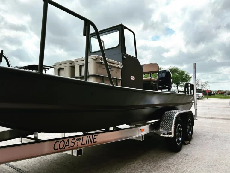 Side of an olive painted aluminum hull
