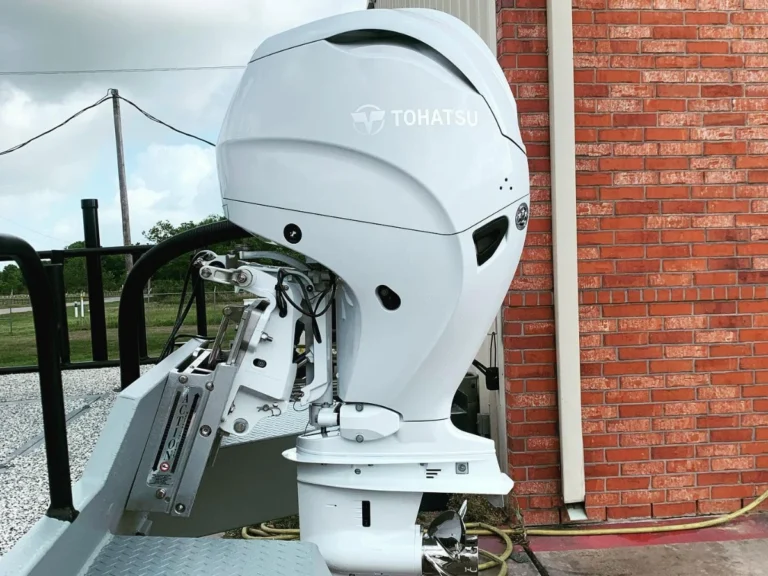White outboard mounted on a jack plate